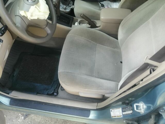 Зелений Тойота Королла, об'ємом двигуна 1 л та пробігом 100 тис. км за 500 $, фото 5 на Automoto.ua