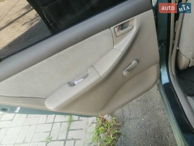 Зеленый Тойота Королла, объемом двигателя 1.8 л и пробегом 100 тыс. км за 600 $, фото 6 на Automoto.ua