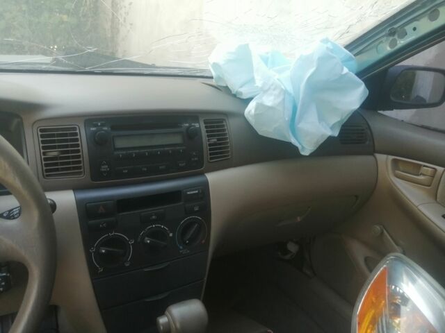 Зелений Тойота Королла, об'ємом двигуна 1 л та пробігом 100 тис. км за 500 $, фото 4 на Automoto.ua