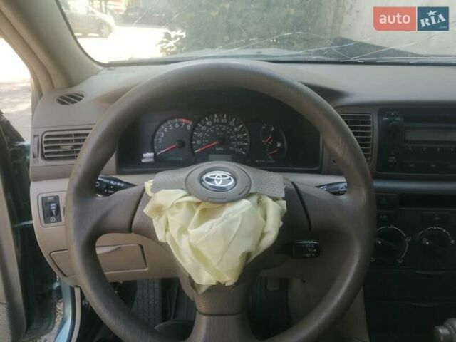 Зеленый Тойота Королла, объемом двигателя 1.8 л и пробегом 100 тыс. км за 600 $, фото 9 на Automoto.ua