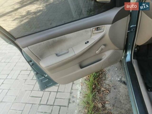 Зеленый Тойота Королла, объемом двигателя 1.8 л и пробегом 100 тыс. км за 600 $, фото 7 на Automoto.ua