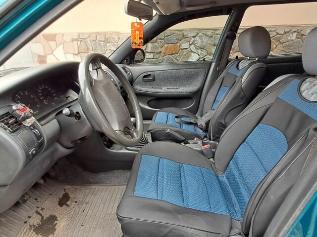 Зеленый Тойота Королла, объемом двигателя 1.3 л и пробегом 300 тыс. км за 3200 $, фото 3 на Automoto.ua