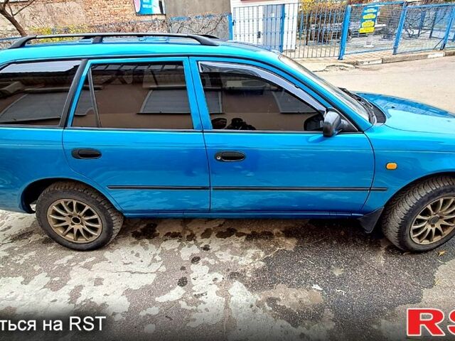 Зеленый Тойота Королла, объемом двигателя 1.3 л и пробегом 300 тыс. км за 3000 $, фото 8 на Automoto.ua