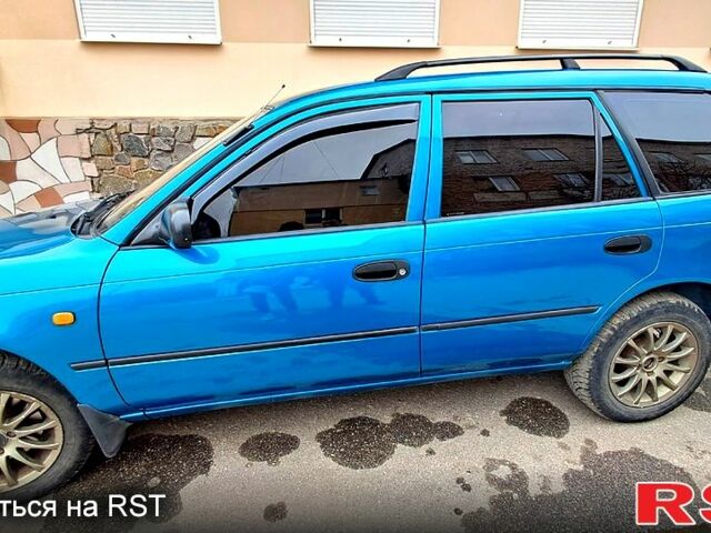 Зеленый Тойота Королла, объемом двигателя 1.3 л и пробегом 300 тыс. км за 3000 $, фото 2 на Automoto.ua