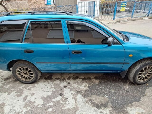 Зеленый Тойота Королла, объемом двигателя 1.3 л и пробегом 300 тыс. км за 3200 $, фото 8 на Automoto.ua