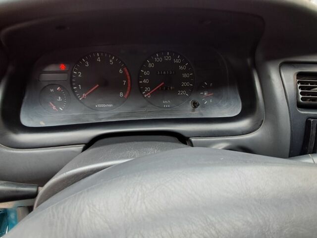 Зеленый Тойота Королла, объемом двигателя 1.3 л и пробегом 300 тыс. км за 3200 $, фото 7 на Automoto.ua