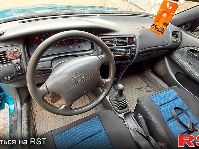 Зеленый Тойота Королла, объемом двигателя 1.3 л и пробегом 300 тыс. км за 3000 $, фото 4 на Automoto.ua