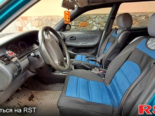 Зеленый Тойота Королла, объемом двигателя 1.3 л и пробегом 300 тыс. км за 3000 $, фото 3 на Automoto.ua