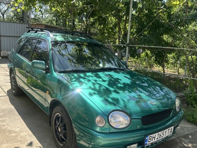 Зеленый Тойота Королла, объемом двигателя 1.3 л и пробегом 100 тыс. км за 3300 $, фото 1 на Automoto.ua