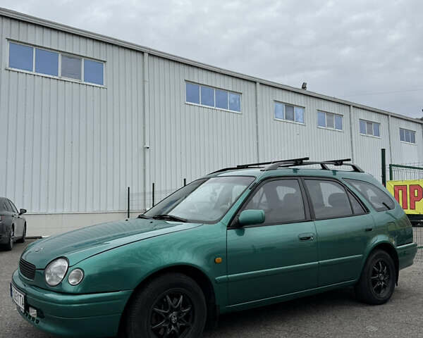 Зеленый Тойота Королла, объемом двигателя 1.33 л и пробегом 390 тыс. км за 3300 $, фото 1 на Automoto.ua