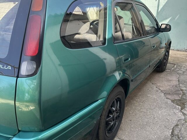 Зеленый Тойота Королла, объемом двигателя 1.3 л и пробегом 100 тыс. км за 3300 $, фото 2 на Automoto.ua