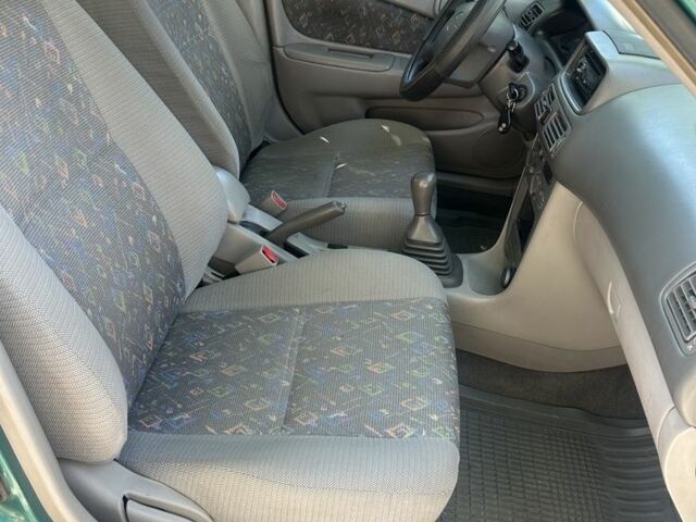 Зеленый Тойота Королла, объемом двигателя 1.3 л и пробегом 100 тыс. км за 3300 $, фото 10 на Automoto.ua