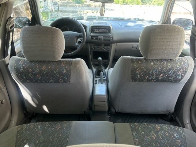 Зеленый Тойота Королла, объемом двигателя 1.3 л и пробегом 100 тыс. км за 3300 $, фото 5 на Automoto.ua