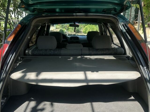 Зеленый Тойота Королла, объемом двигателя 1.3 л и пробегом 100 тыс. км за 3300 $, фото 9 на Automoto.ua