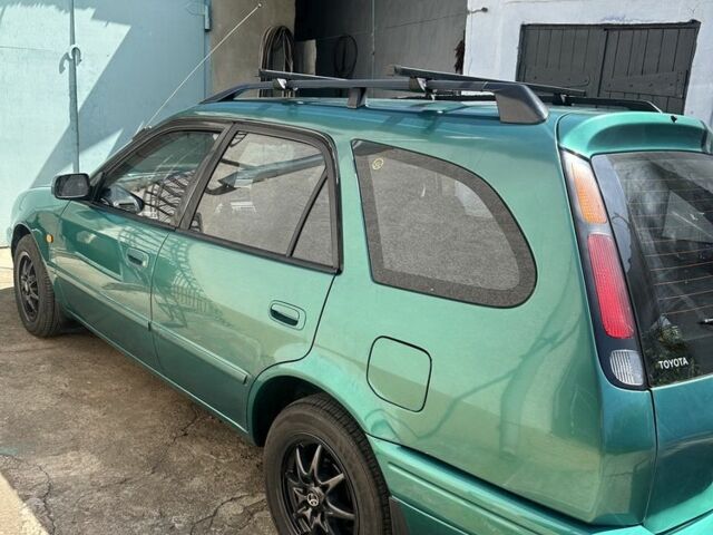 Зеленый Тойота Королла, объемом двигателя 1.3 л и пробегом 100 тыс. км за 3300 $, фото 3 на Automoto.ua