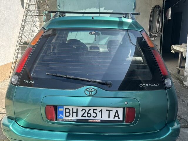 Зеленый Тойота Королла, объемом двигателя 1.3 л и пробегом 100 тыс. км за 3300 $, фото 4 на Automoto.ua