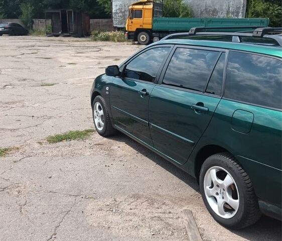 Зеленый Тойота Королла, объемом двигателя 2 л и пробегом 270 тыс. км за 110000 $, фото 12 на Automoto.ua