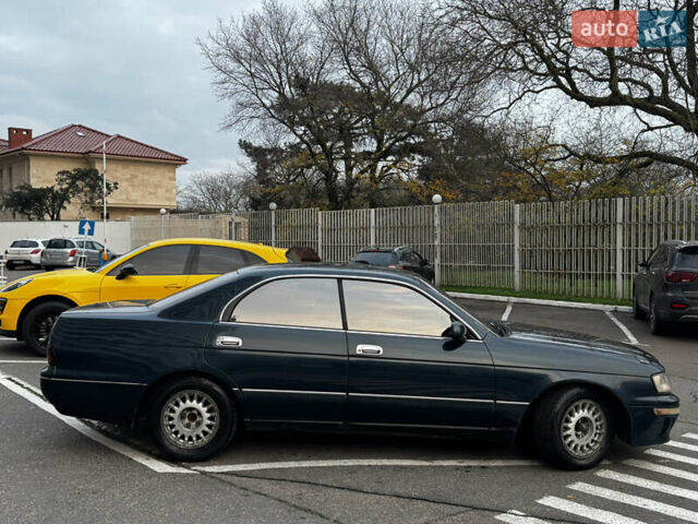 Зеленый Тойота Краун, объемом двигателя 2.5 л и пробегом 470 тыс. км за 3000 $, фото 2 на Automoto.ua