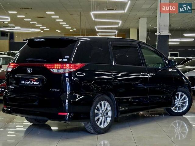 Черный Тойота Эстима, объемом двигателя 2.36 л и пробегом 128 тыс. км за 13999 $, фото 1 на Automoto.ua