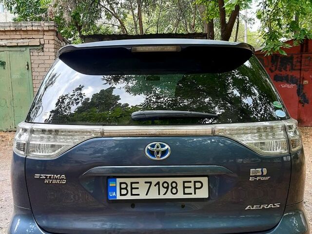 Синий Тойота Эстима, объемом двигателя 2.4 л и пробегом 103 тыс. км за 16700 $, фото 1 на Automoto.ua