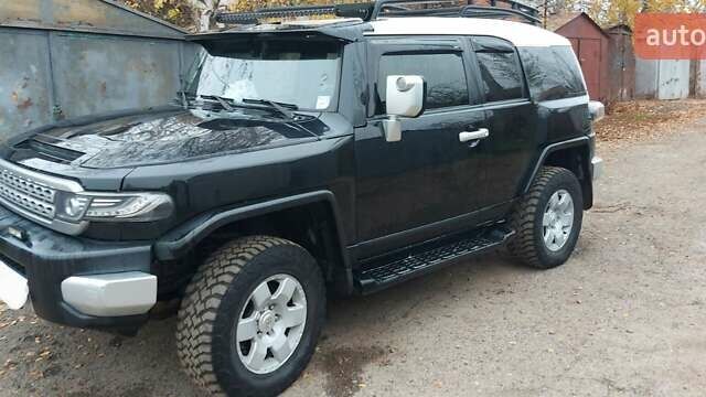 Чорний Тойота ФЖ Крузер, об'ємом двигуна 4 л та пробігом 350 тис. км за 20000 $, фото 2 на Automoto.ua
