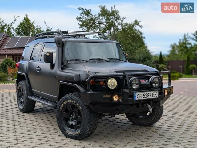 Черный Тойота ФЖ Крузер, объемом двигателя 4 л и пробегом 214 тыс. км за 21999 $, фото 68 на Automoto.ua