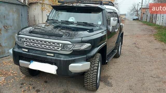 Чорний Тойота ФЖ Крузер, об'ємом двигуна 4 л та пробігом 350 тис. км за 20000 $, фото 1 на Automoto.ua