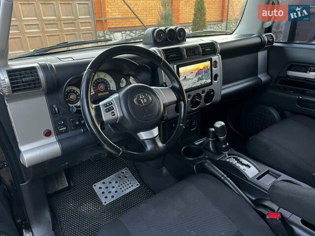 Чорний Тойота ФЖ Крузер, об'ємом двигуна 4 л та пробігом 321 тис. км за 21500 $, фото 26 на Automoto.ua