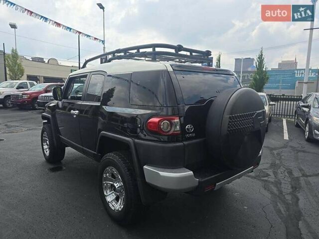 Черный Тойота ФЖ Крузер, объемом двигателя 4 л и пробегом 177 тыс. км за 16000 $, фото 2 на Automoto.ua