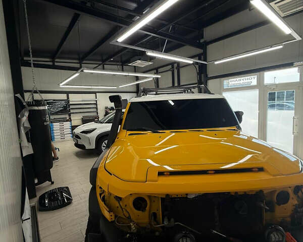 Жовтий Тойота ФЖ Крузер, об'ємом двигуна 4 л та пробігом 195 тис. км за 22500 $, фото 19 на Automoto.ua