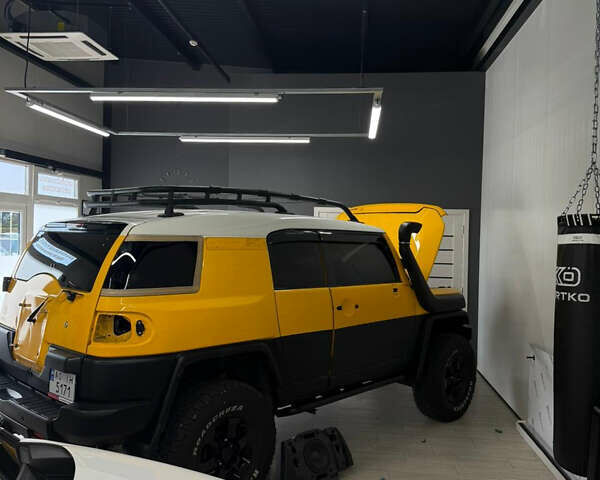 Жовтий Тойота ФЖ Крузер, об'ємом двигуна 4 л та пробігом 195 тис. км за 22500 $, фото 21 на Automoto.ua