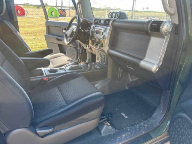 Зелений Тойота ФЖ Крузер, об'ємом двигуна 4 л та пробігом 87 тис. км за 8700 $, фото 9 на Automoto.ua