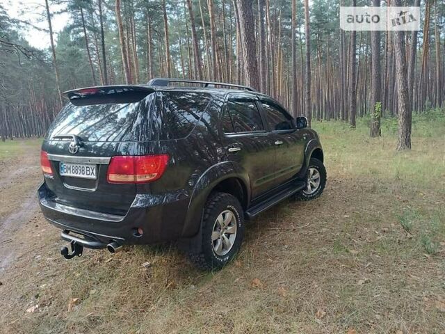 Тойота Фортунер 2005 у Лебедине на Automoto.ua Чорний Тойота Фортунер, об'ємом двигуна 4 л та пробігом 232 тис. км за 11700 $, фото 2 на Automoto.ua