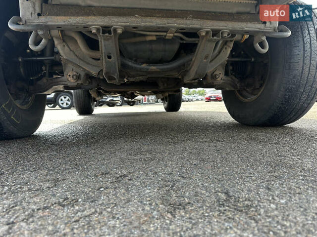 Серый Тойота Фортунер, объемом двигателя 3.96 л и пробегом 310 тыс. км за 8900 $, фото 2 на Automoto.ua