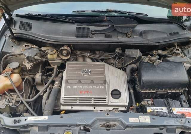 Сірий Тойота Харріер, об'ємом двигуна 3 л та пробігом 243 тис. км за 9500 $, фото 3 на Automoto.ua