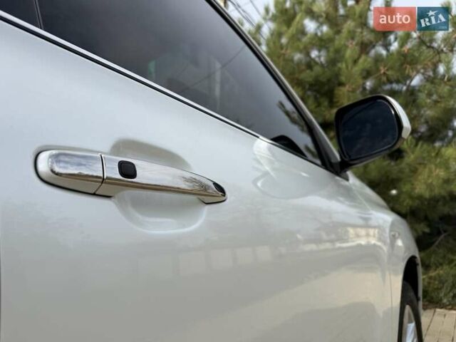 Белый Тойота Хайлендер, объемом двигателя 3.46 л и пробегом 152 тыс. км за 18700 $, фото 83 на Automoto.ua