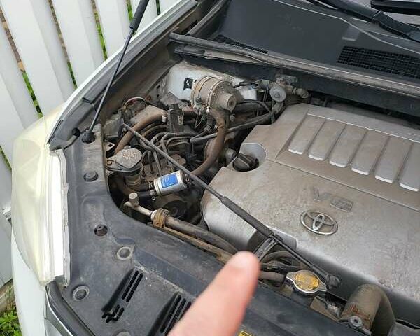 Белый Тойота Хайлендер, объемом двигателя 3.5 л и пробегом 207 тыс. км за 16500 $, фото 6 на Automoto.ua