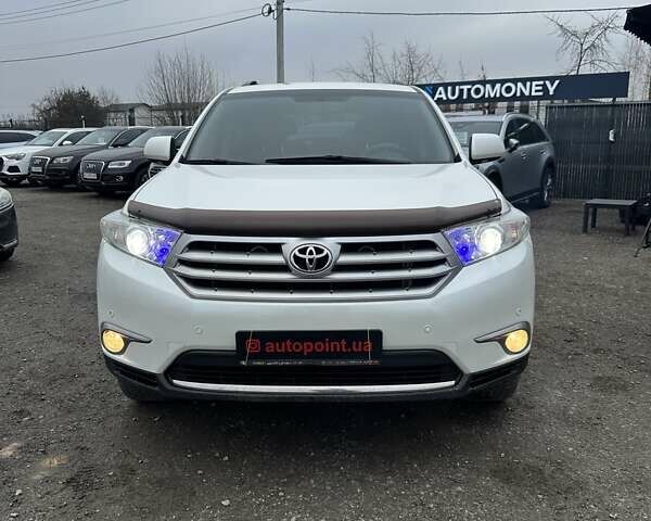 Белый Тойота Хайлендер, объемом двигателя 3.46 л и пробегом 199 тыс. км за 18000 $, фото 1 на Automoto.ua