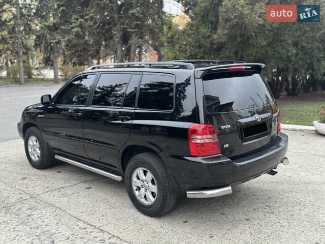 Чорний Тойота Хайлендер, об'ємом двигуна 3 л та пробігом 320 тис. км за 7400 $, фото 4 на Automoto.ua