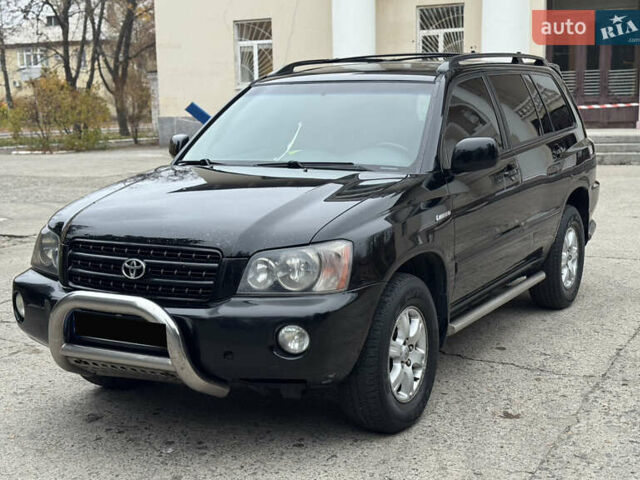 Чорний Тойота Хайлендер, об'ємом двигуна 3 л та пробігом 320 тис. км за 7400 $, фото 1 на Automoto.ua