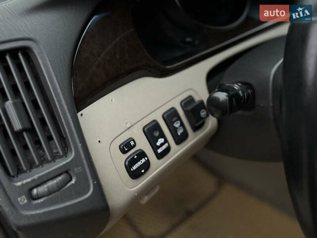 Чорний Тойота Хайлендер, об'ємом двигуна 3 л та пробігом 320 тис. км за 7400 $, фото 22 на Automoto.ua