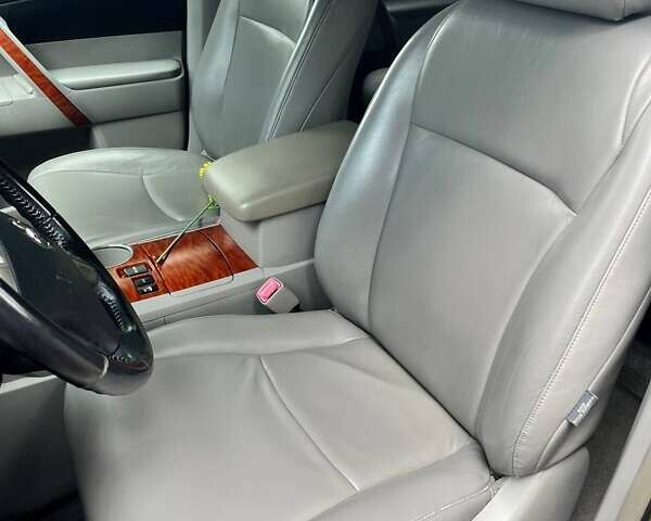 Черный Тойота Хайлендер, объемом двигателя 3.46 л и пробегом 253 тыс. км за 12900 $, фото 38 на Automoto.ua