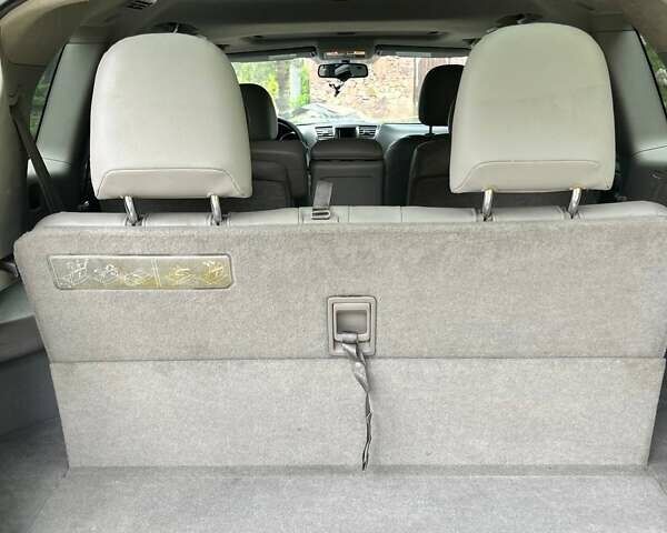 Черный Тойота Хайлендер, объемом двигателя 3.46 л и пробегом 253 тыс. км за 12900 $, фото 56 на Automoto.ua