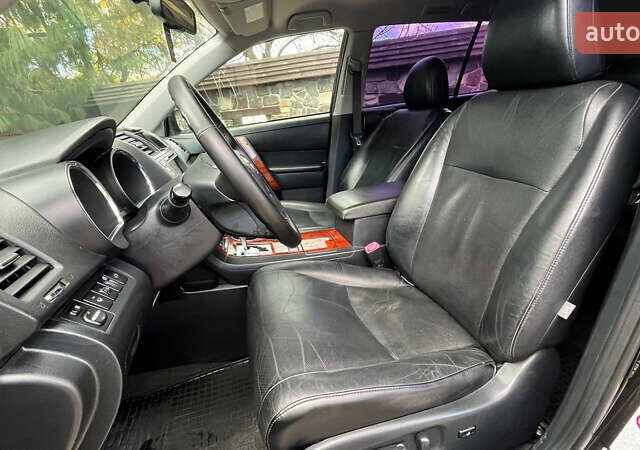 Чорний Тойота Хайлендер, об'ємом двигуна 3.46 л та пробігом 275 тис. км за 14900 $, фото 19 на Automoto.ua