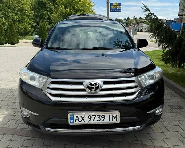 Черный Тойота Хайлендер, объемом двигателя 3.46 л и пробегом 183 тыс. км за 17500 $, фото 1 на Automoto.ua