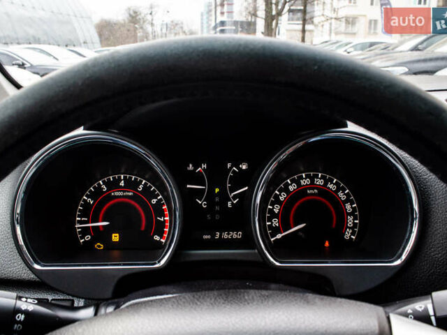 Черный Тойота Хайлендер, объемом двигателя 3.46 л и пробегом 316 тыс. км за 16300 $, фото 1 на Automoto.ua