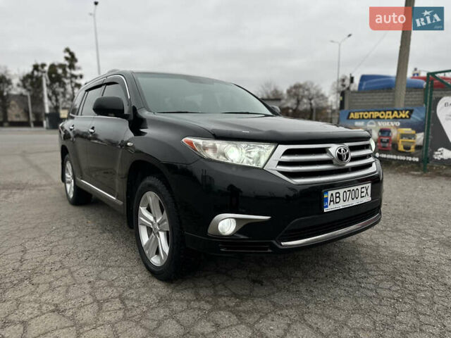 Черный Тойота Хайлендер, объемом двигателя 3.46 л и пробегом 203 тыс. км за 17000 $, фото 1 на Automoto.ua