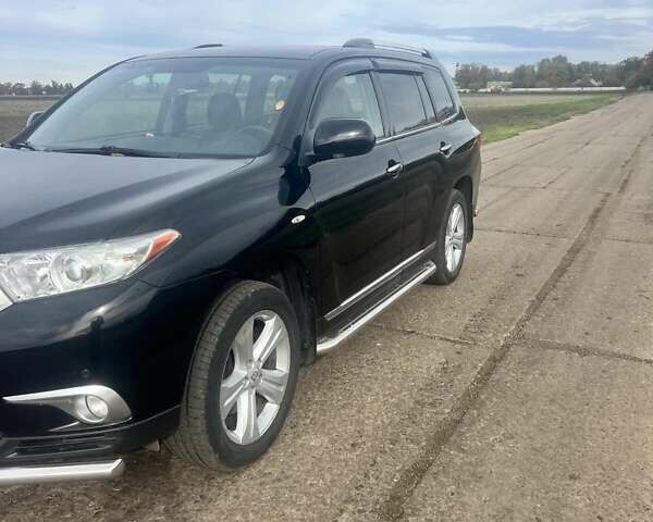 Черный Тойота Хайлендер, объемом двигателя 3.5 л и пробегом 140 тыс. км за 15999 $, фото 1 на Automoto.ua