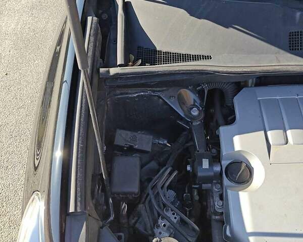 Черный Тойота Хайлендер, объемом двигателя 3.46 л и пробегом 188 тыс. км за 18000 $, фото 2 на Automoto.ua