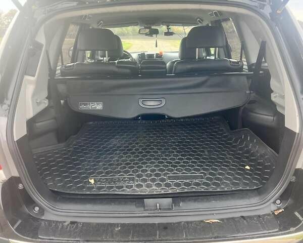 Черный Тойота Хайлендер, объемом двигателя 3.5 л и пробегом 140 тыс. км за 15999 $, фото 2 на Automoto.ua